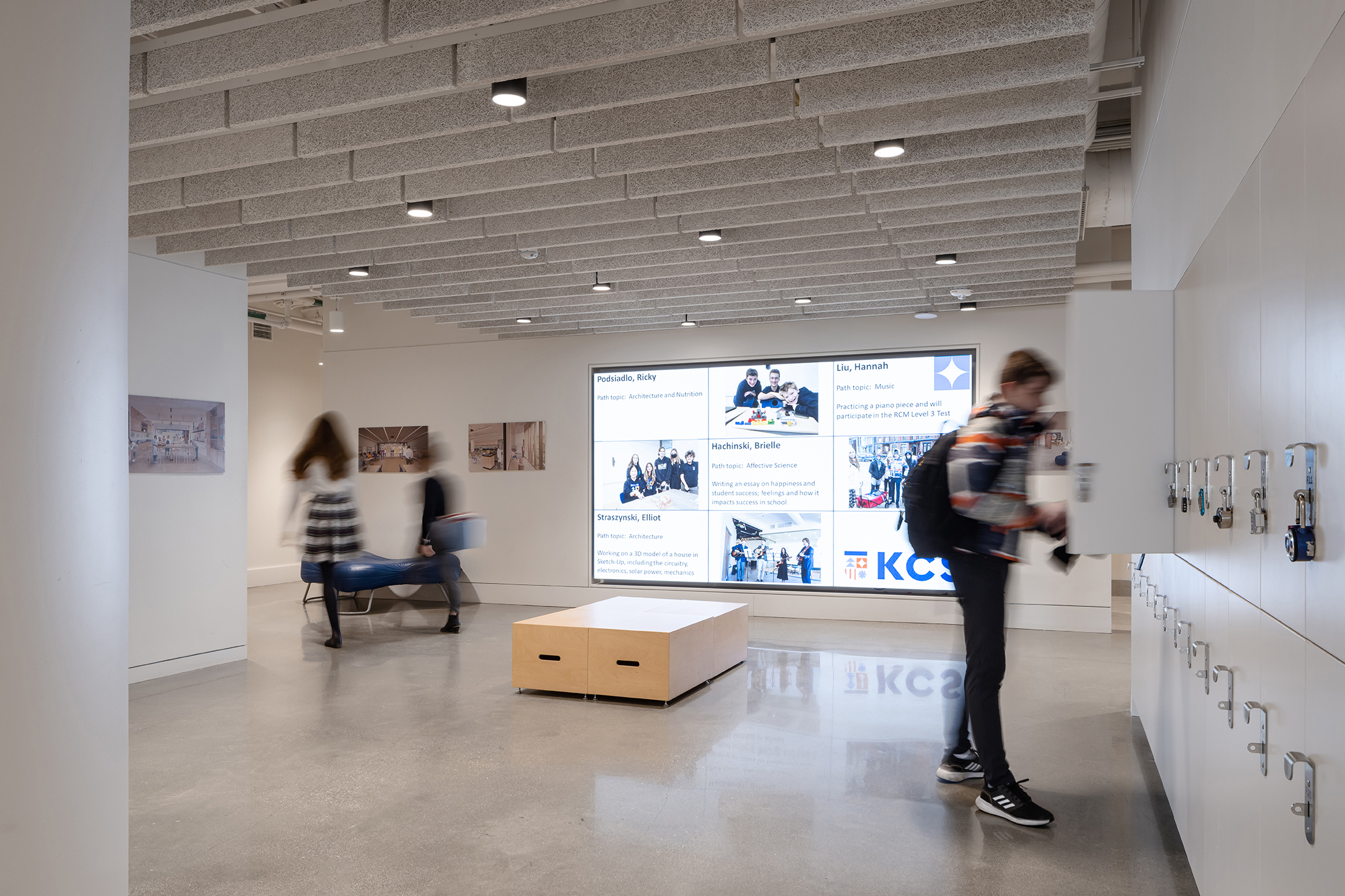 image of media wall, locker area, and students at KCS